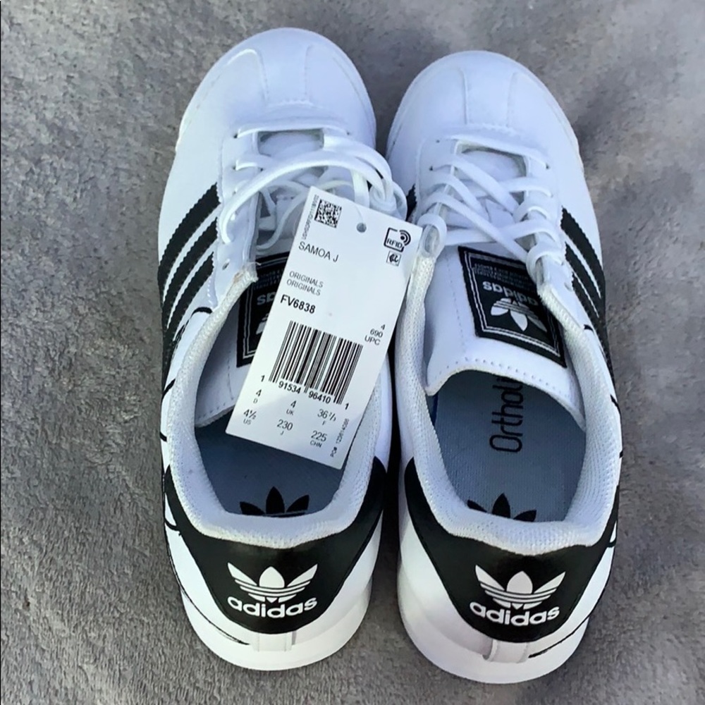 Never worn Adidas sneakers